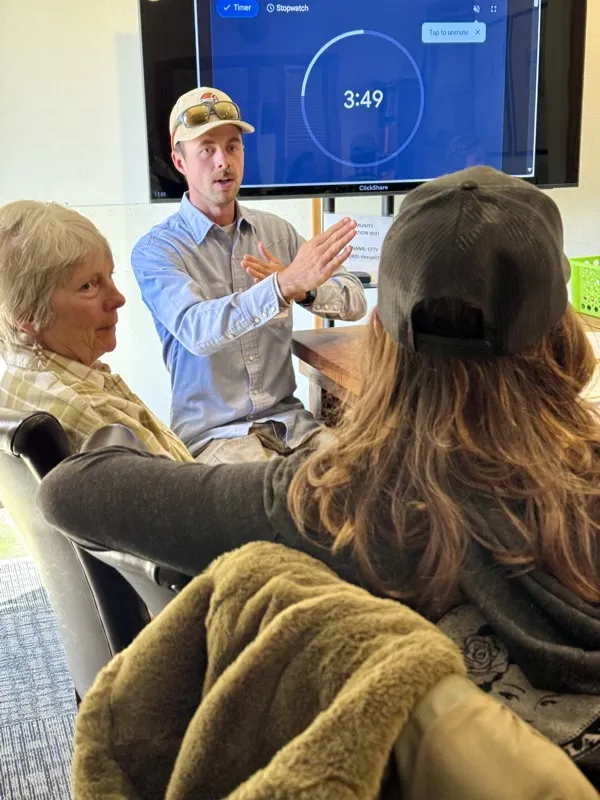 Community member leading a discussion at a Teton Valley nonprofit meeting